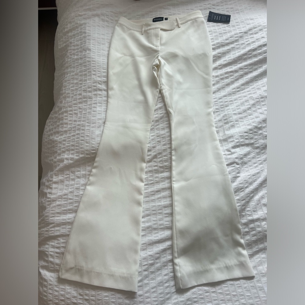 Retrofete cream flare bottom pants. NWT. Size small
